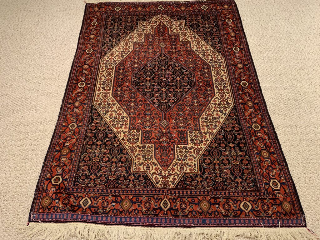 Antique Senneh wool Persian rug