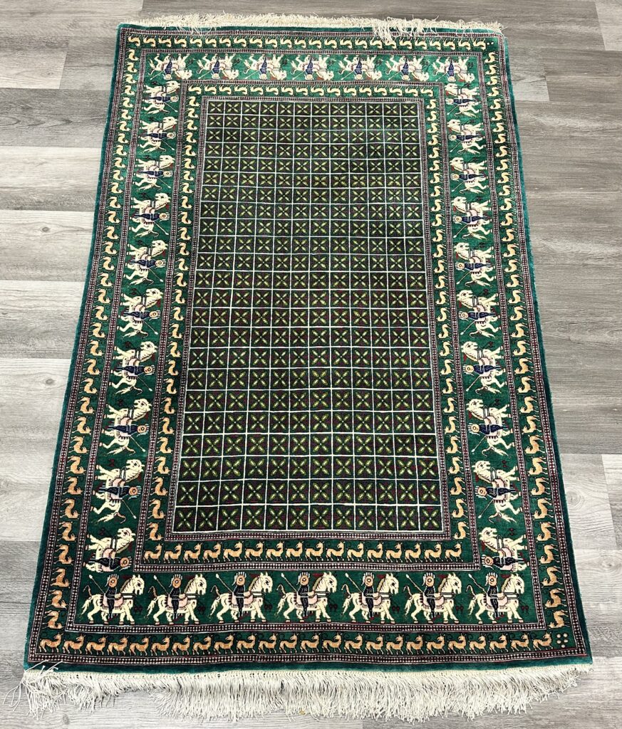 Hand-knotted Qom pure silk Persian rug with an ivory field and floral border